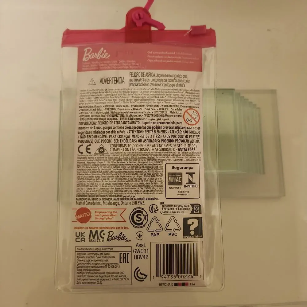 Barbie NIP Contains 1 Coat, Shorts and watch